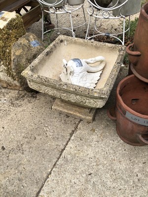 Lot 1304 - A square form terrace planter and swan ornament