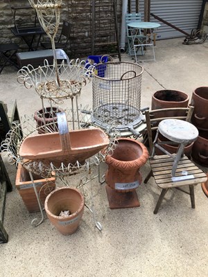 Lot 1310 - A three tier wirework garden plant stand.