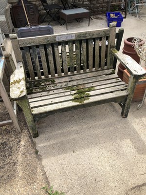 Lot 1311 - Two small teak garden benches.