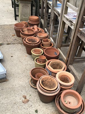 Lot 1327 - A large selection of terracotta plant pots