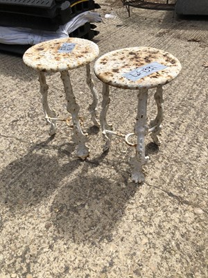 Lot 1331 - A pair of cast iron garden plant stands.