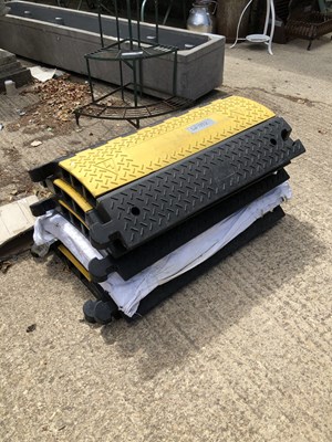 Lot 1332 - A set of six "speedbump" cable protector ramps...