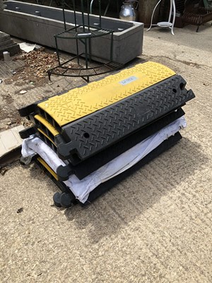 Lot 1332 - A set of six "speedbump" cable protector ramps...