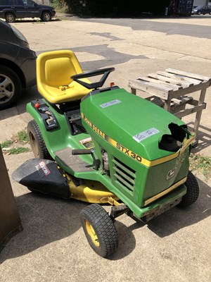 Lot 1339 - A John Deere tractor mower. STX 30
