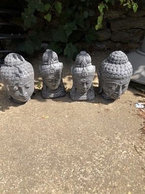 Lot 1342 - Four eastern deity heads