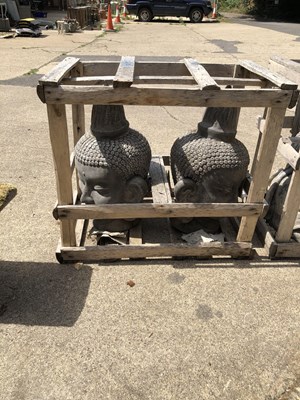 Lot 1353 - Two large eastern Deity heads
