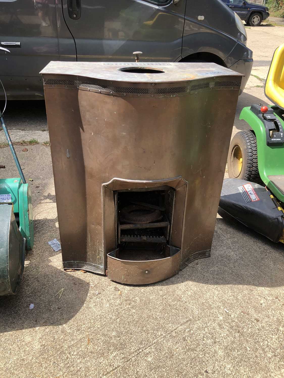 Lot 1356 - a copper clad fireplace.