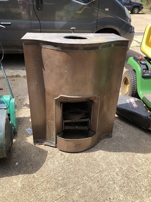 Lot 1356 - a copper clad fireplace.