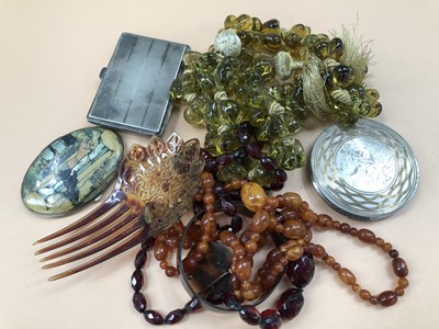 Lot 578 - Large olive green glass continuous necklace, a...