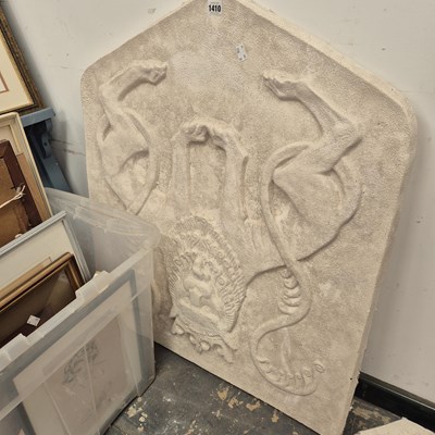 Lot 1410 - A plaster wall plaque- armorial of rampant...