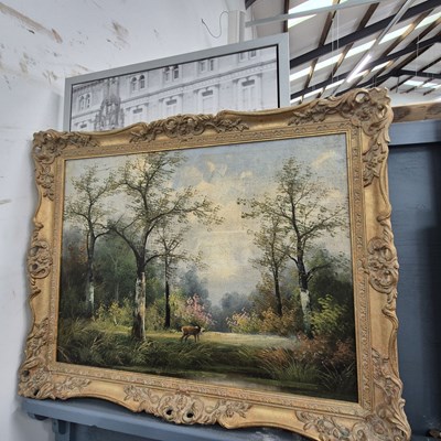 Lot 1439 - A large oil on canvas, stag in woodlands.