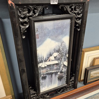 Lot 1574 - A set of four oriental ebonised framed panels.