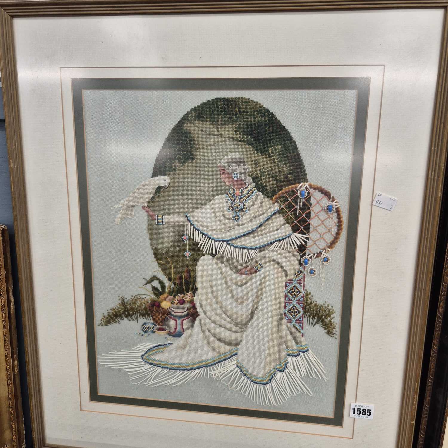 Lot 1585 - An embroidered picture with beadwork.
