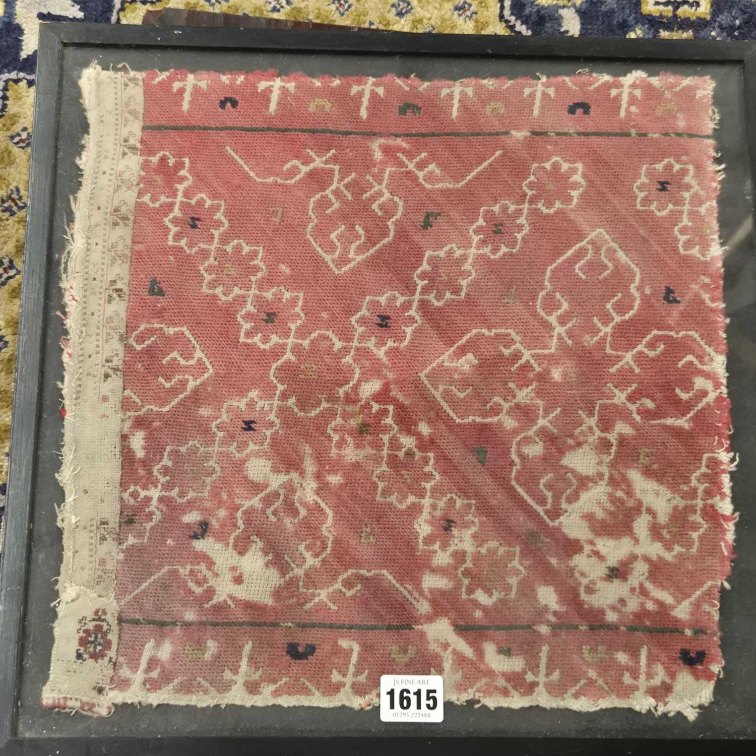 Lot 1615 - An early eastern textile fragment and a