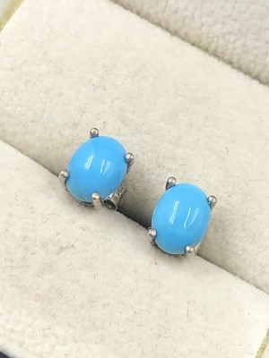 Lot 525a - Pair of oval cabochon turquoise studs in...