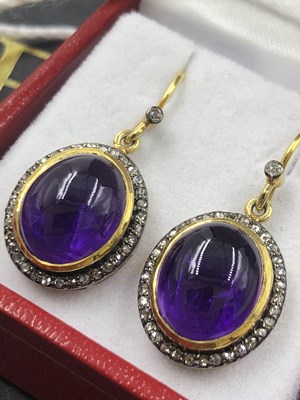 Lot 525 - Pair of silver gilt oval cabochon amethyst and...