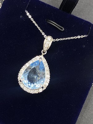 Lot 530a - A large pear-shaped aquamarine and diamond...
