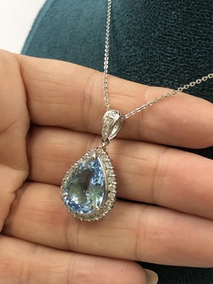 Lot 530 - A large pear-shaped aquamarine and diamond...