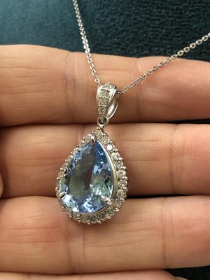 Lot 530 - A large pear-shaped aquamarine and diamond...