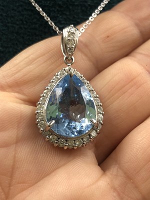 Lot 530 - A large pear-shaped aquamarine and diamond...