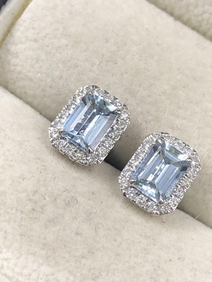 Lot 540c - A pair of emerald-cut aquamarine and diamond...