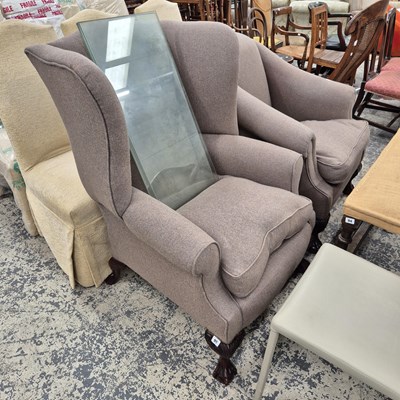 Lot 95 - A Large Georgian style wing back armchair and...