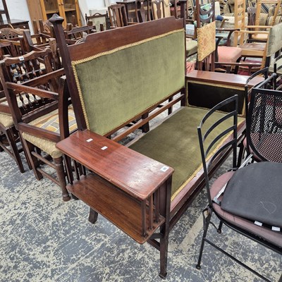 Lot 99 - An Art Nouveau mahogany settle. H 121 W 146 D...