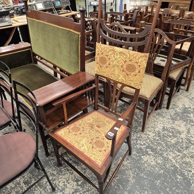 Lot 104 - An Art Nouveau high back armchair.