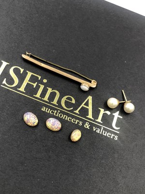 Lot 593 - A pair of pearl stud earrings stamped 375,...