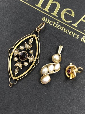 Lot 594 - A vintage garnet and pearl pendant, the bale...