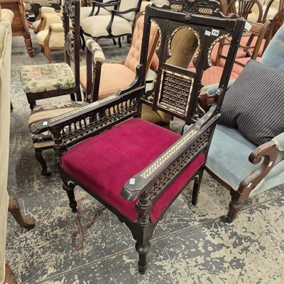 Lot 119 - A carved and inlaid antique arm,chair in the...