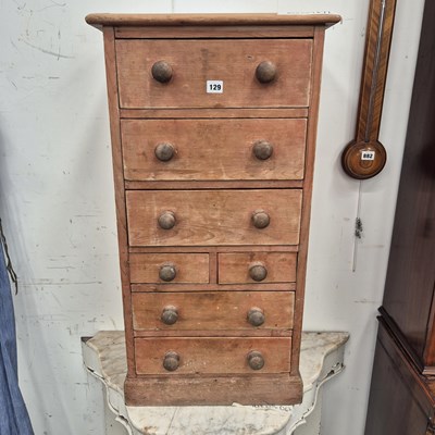 Lot 129 - An unusual small nest of pine drawers