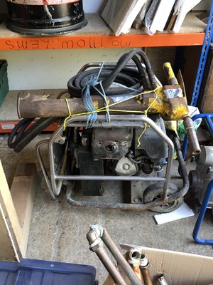 Lot 1367 - A heavy duty compressor with a numatic drill