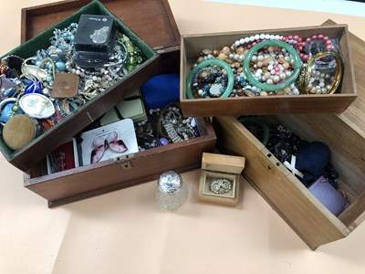 Lot 606 - Two-hinged wooden caskets containing vintage...