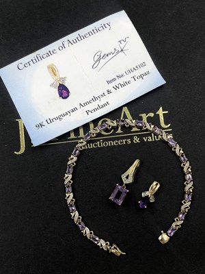 Lot 612 - A 9ct hallmarked gold amethyst line bracelet,...