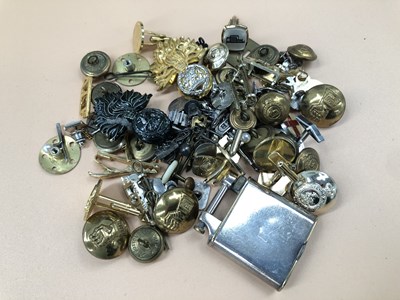 Lot 553 - A collection of military buttons, badges, pins,...