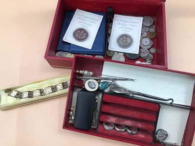 Lot 561 - A vintage jewellery box containing a small...