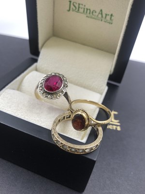 Lot 574 - A 9ct hallmarked gold garnet ring, a 9ct and...
