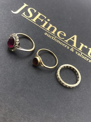 Lot 574 - A 9ct hallmarked gold garnet ring, a 9ct and...