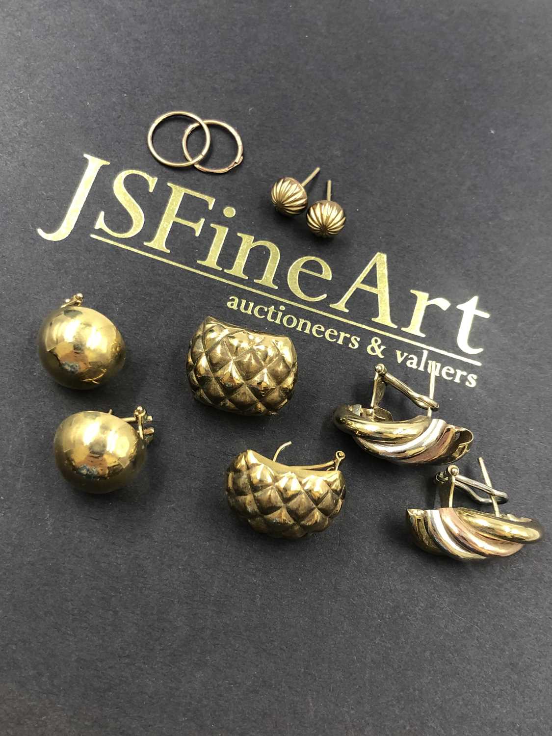 Lot 616 - Five pairs of 9ct gold earrings, some with...