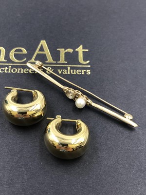 Lot 620 - A pair of 18ct hallmarked gold puffy hoop...