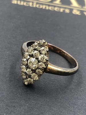 Lot 621 - An old-cut diamond navette-shaped panel ring....