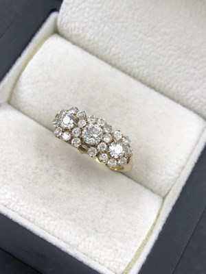 Lot 630 - An 18ct hallmarked gold (marks rubbed) triple...