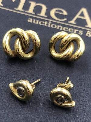 Lot 631 - Two pairs of 18ct hallmarked gold stud...