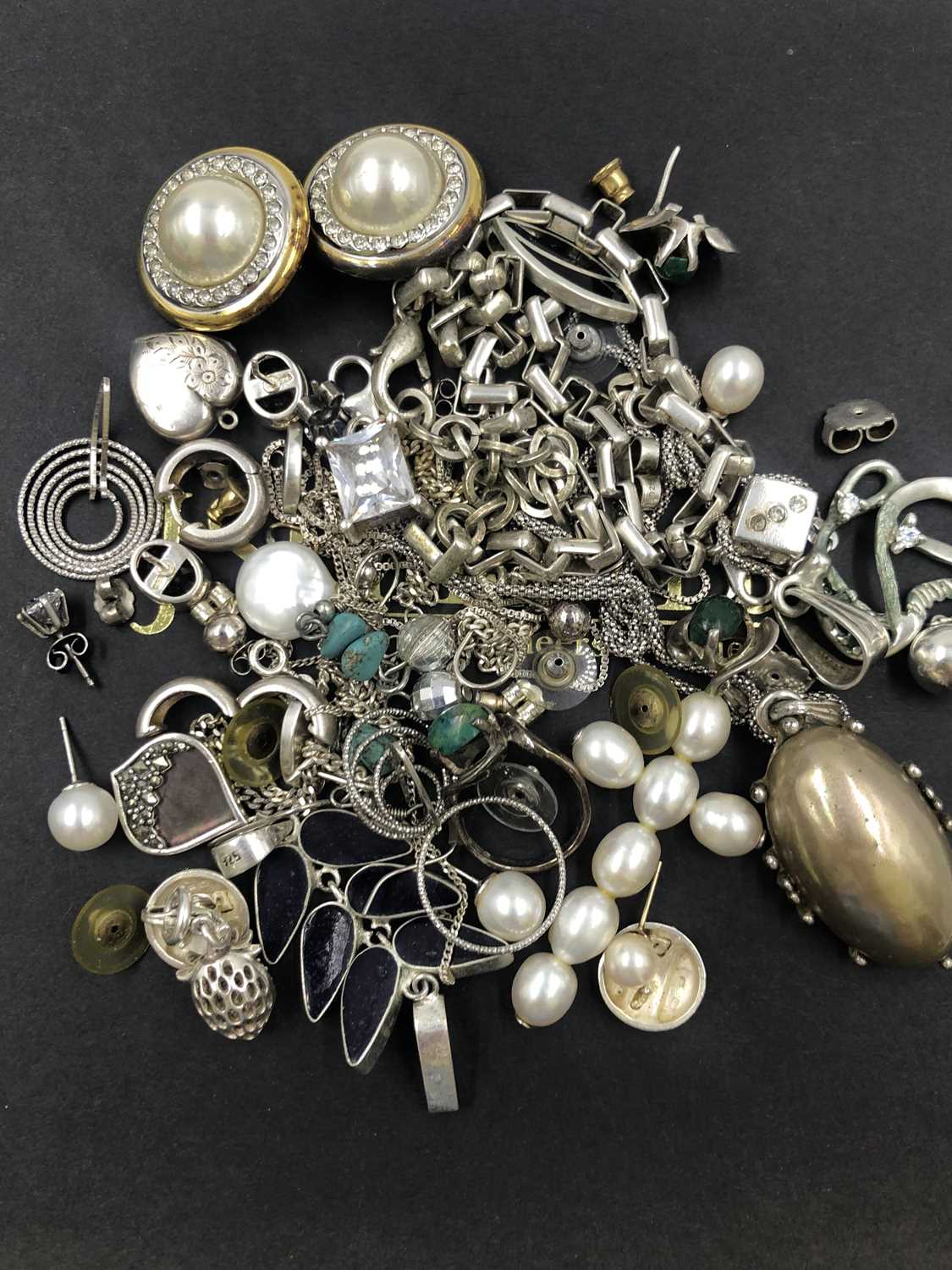 Lot 635 - A collection of silver and costume jewellery,...