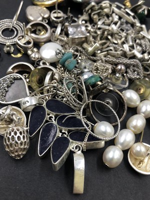 Lot 635 - A collection of silver and costume jewellery,...