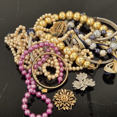 Lot 635 - A collection of silver and costume jewellery,...