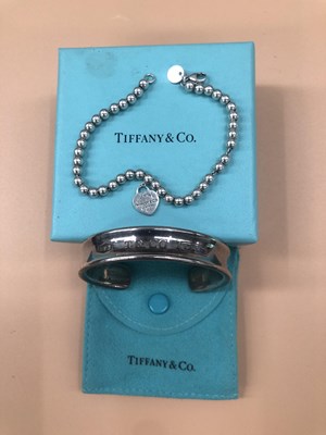 Lot 638b - Tiffany- A silver Tiffany cuff, and bead and...