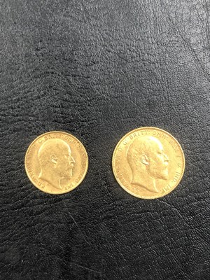 Lot 497 - A 22ct gold full and a half sovereign, both...