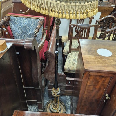 Lot 164 - A Gilt and ebonised standard lamp